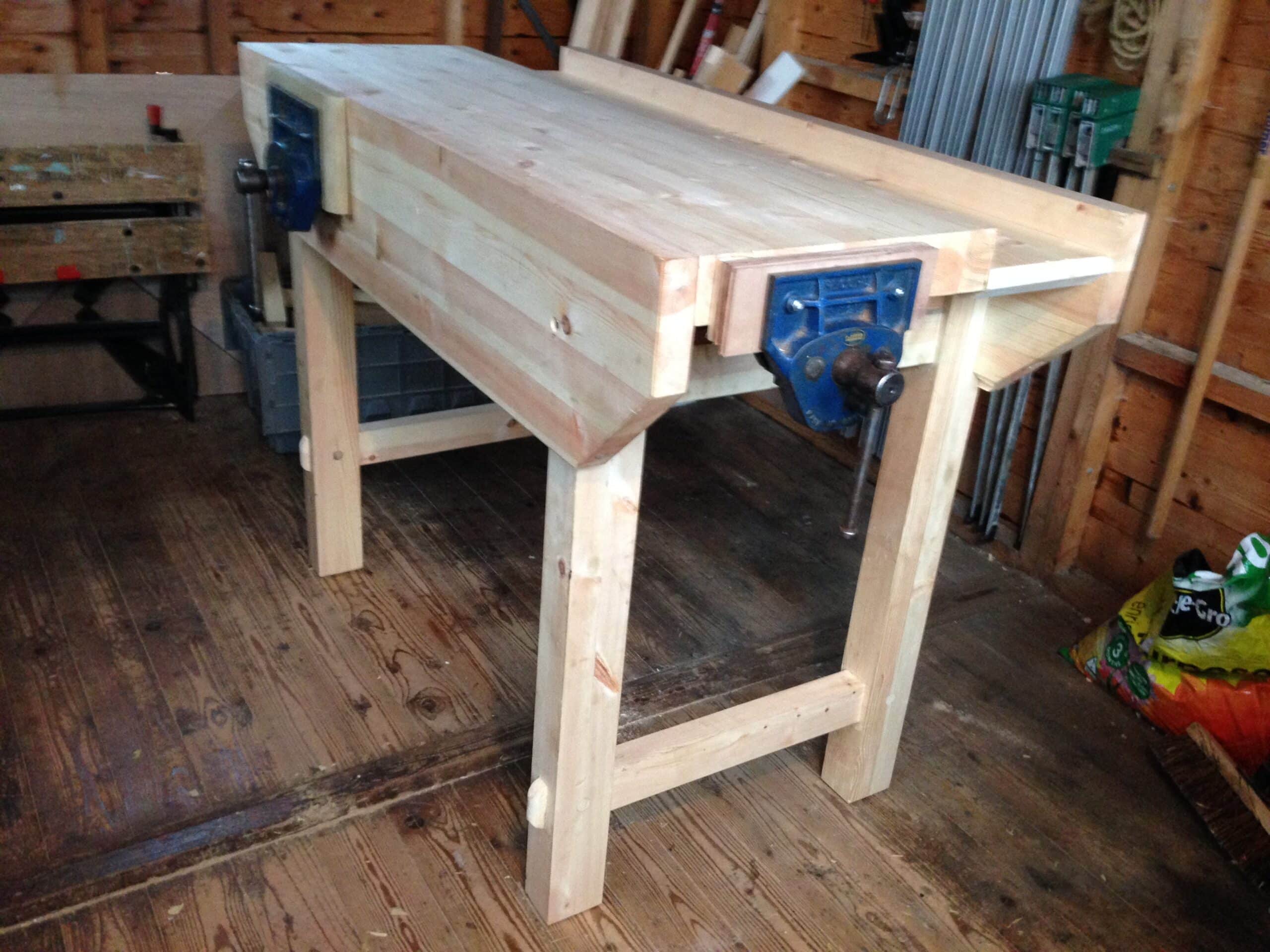 Spruce top with reclaimed timber for the legs and Mahogany vise jaws.