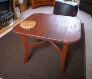 a small 22" sq coffee table from salvaged 1" teak boards