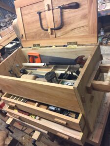 I started on this before I found Mr. Seller's tool chest video, but it is similar. Maple and Cyprus. I'm 17 and this was my first project to use almost no metal fasteners. Thank you Mr. Sellers!