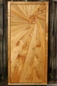I promised a door for a friend and he didn't know which design I had in mind. I tried to design it to mimic his way of life (and mine too). So there is the Sun door.
