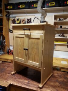 Small cabinet made from pine and finished with shellac