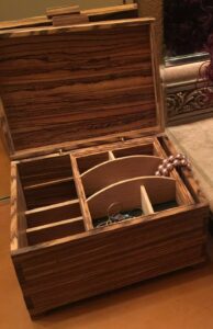 Zebrawood and European beech jewelry box with sliding top tray. Finished with Tung oil.