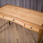 Writing desk for my wife. Made with quarter sawn cherry, Maple and birdseye maple veneer. Ebony leg cuffs and drawer pulls