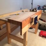 Just finished the workbench based on Paul's design! 5 feet long by 27 inches wide by 38 inches tall, made from western spruce with Veritas quick-release vise with plywood liner.