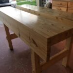 New workbench made from SPF from the big box store. Had to plane up quite a bit as it was not the clearest but it worked . Finished with shellac and 0000 wire wool and wax.