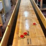 Shuffleboard table built from a reclaimed park shelter beam and pine.