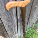 Red Oak handle with a Poplar staff. Oak was finished with Polyurethane and staff was finished with Linseed oil which turned it a dark olive color.