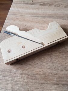 rebate plane with adjustable guide made in pine.