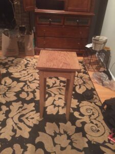 White oak. I followed the instructions in the book. This was my first functional piece of furniture and I use it to hold a lamp in my bedroom.