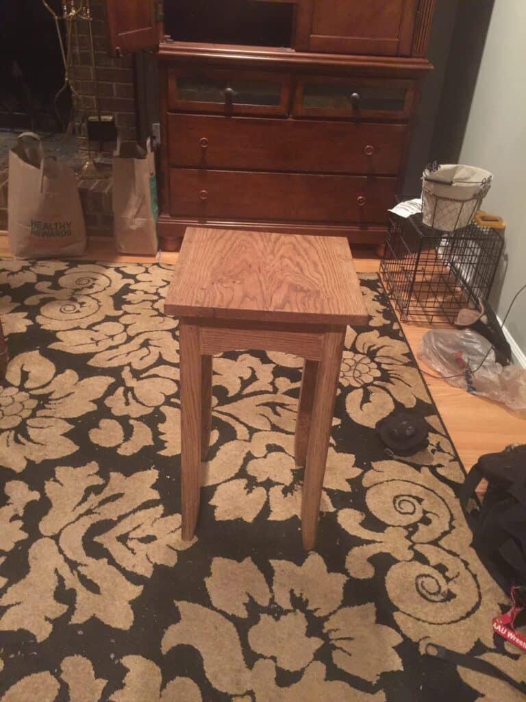 White oak. I followed the instructions in the book. This was my first functional piece of furniture and I use it to hold a lamp in my bedroom.