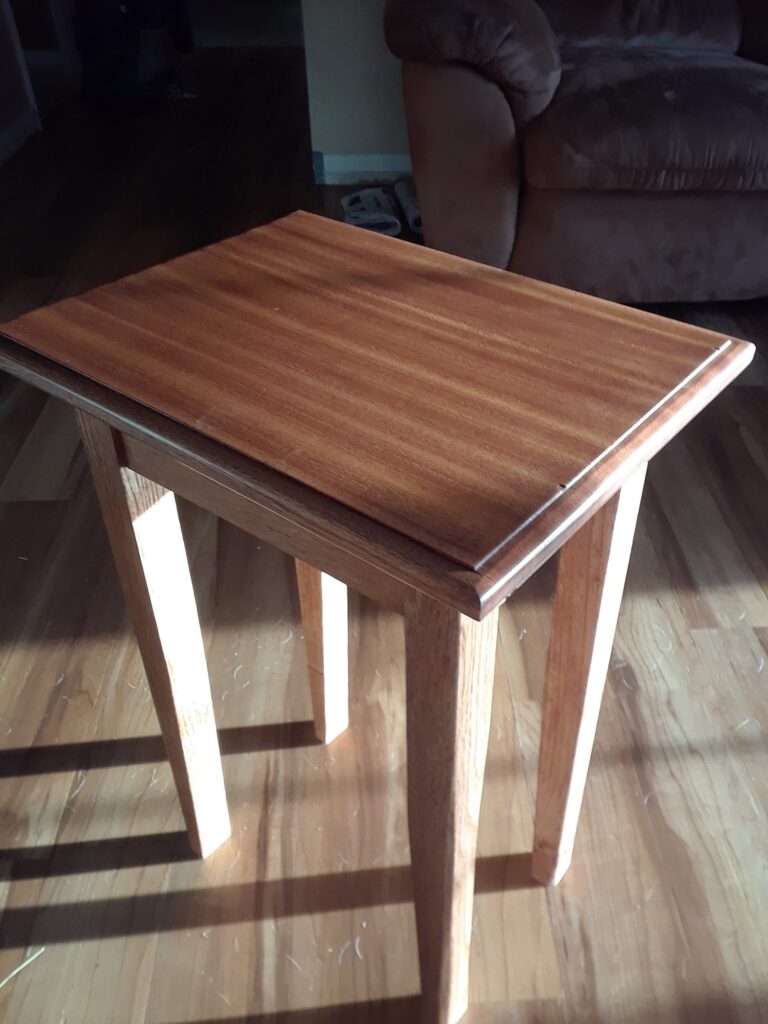 Oak and Sapele table for my wife. She wanted the legs to be straight instead of shaped so I had to leave them.