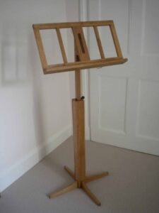 A music stand for my wife. It is made of oak, The walnut inlay hides screws that fix the platen to the upright. The height adjuster is a (bought) rosewood viola tuning peg. All done with hand tools. Thank you Paul and team for giving me the confidence and knowledge to undertake it.