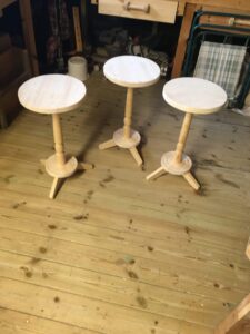 A trio of tables. Made with hand tools posts were finished on the lathe. Customer to finish treating.