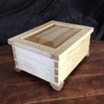 Box made with Pine cut offs glued together, top Ash frame with Elm insert Shellac finish