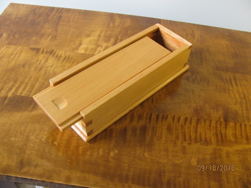 Small Sliding Lid box, made from old wood from toolbox till. Note nail hole in bottom. Wood seems to be spruce or white pine.