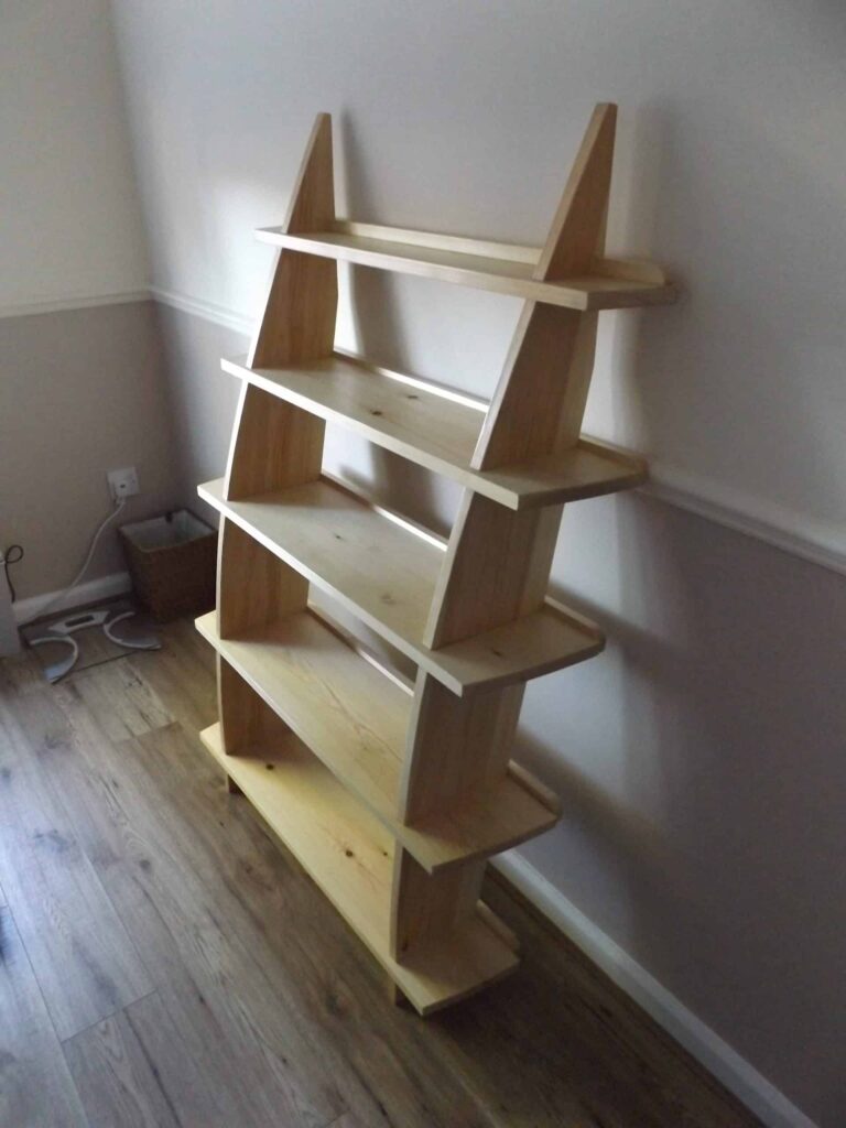 Leaning Wall Shelf in Builders Pine - two-thirds size. Unfortunately there is a dado rail in the way. I may recess the backstops as in the top shelf.