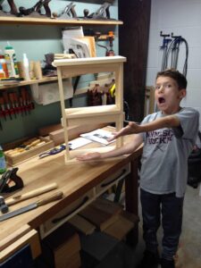 Another picture of my grandson part way through the build having a good time woodworking with Papa! Thanks again.