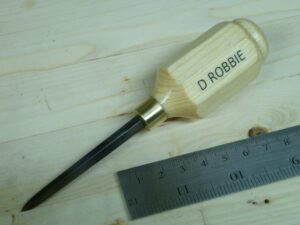 I got the idea after seeing an awl that Paul had. I made the handle out of a 1.25" dowel that I planed to 8 sides then turned on my mini lathe. I made the ferrule from a brass fitting and the square awl from a 3.5" hardened masonry nail. I first annealed the nail, then shaped it with files and sandpaper. I then hardened in with oil quenching and then tempered at 400F in a toaster oven. To get the name like Paul had on his handle, I just laser printed out my name in mirror image then placed on a wetted side with clear waterbased polyurethane. I let dry then put water on it and lightly rubbed the paper off leaving the name.