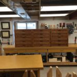 Red oak and red oak plywood. Mostly used jointer, smoother and hand-router. Craftsman style faced drawers and panels. Drawers are made of 1/2 Russian Birch. Finish is stain and tungsten oil.