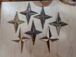 A few stars made for Christmas presents, Spalted Maple, Walnut, Red Oak, White Oak, Elm and Cherry woods