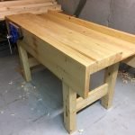 I made the new workbench and followed the design fairly closely. Made of SPF 2x4s and some eastern white pine for the aprons. It took so long to prepare all of the lumber with a handplane, but once that was done the bench came together fairly quickly. I love it!