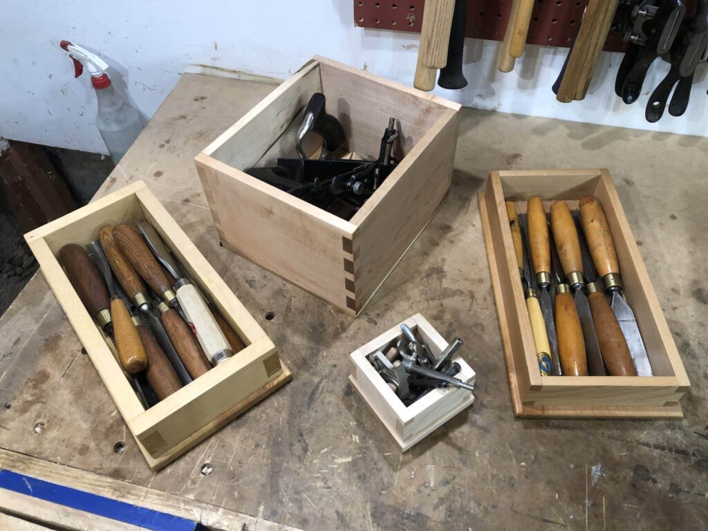 Collection of dovetail boxes for tools