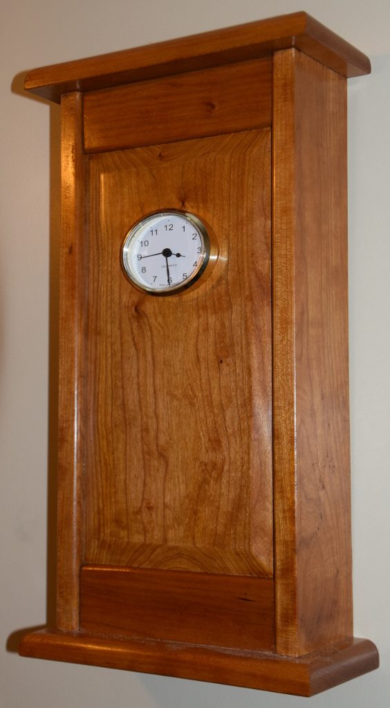 Wall Clock in Cherry. Number 3 of 5 made. This one made from Cherry but stained with Aged Yew stain before finishing in Shellac and polishing with Beeswax and Turpentine