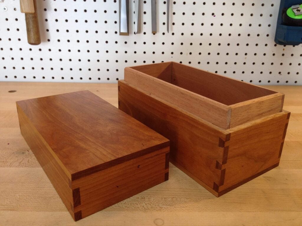 cherry with garnett shellac on outer wood; unfinished wood for inside lining/lip is spanish cedar (smells wonderful); for my dad's birthday I make a box to put his gift in. We both know what the real gift is. Thanks Paul for teaching me how to do this.