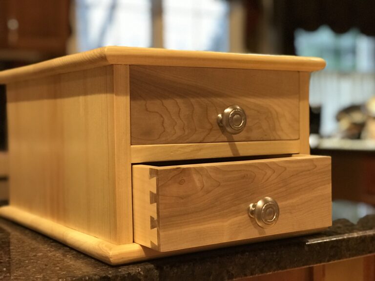 Built from scrap pine intended for the fire pit. Now a most useful craft organizer for my wife. Fronts are maple. Finished with shellac.