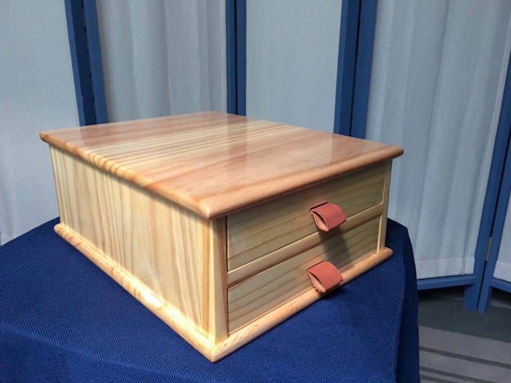 Paul's design, just scaled it a little bit. Made out of Pine, drawer bottoms and cabinet back included. Finished with tru-oil and padded shellac. I use it for storing my chisels.