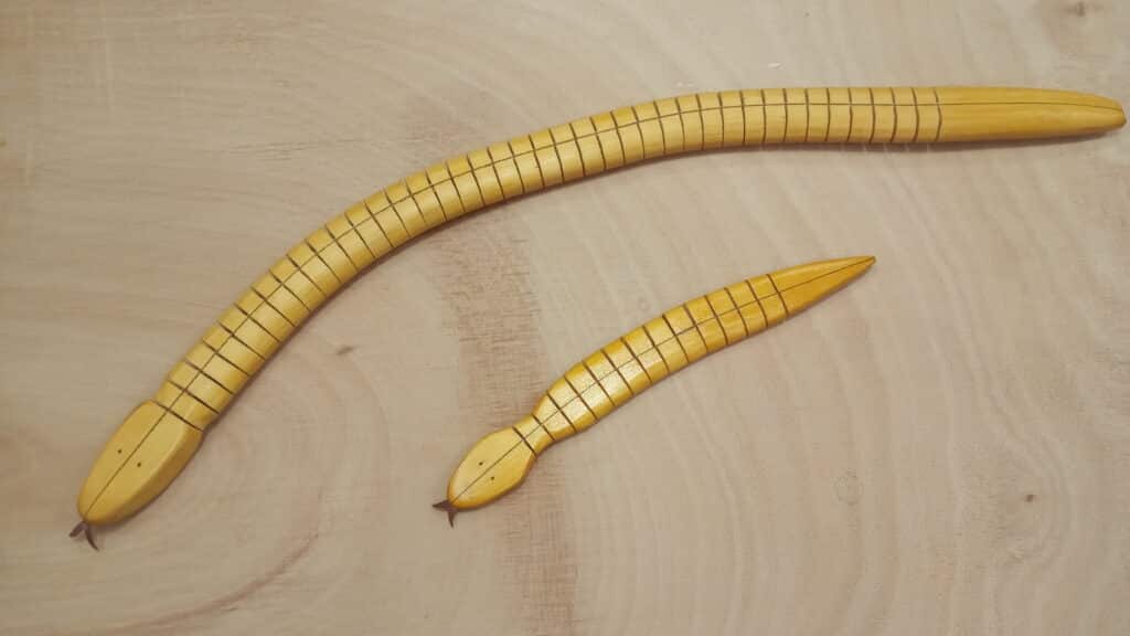 Wooden Snakes by Ermir Agaci