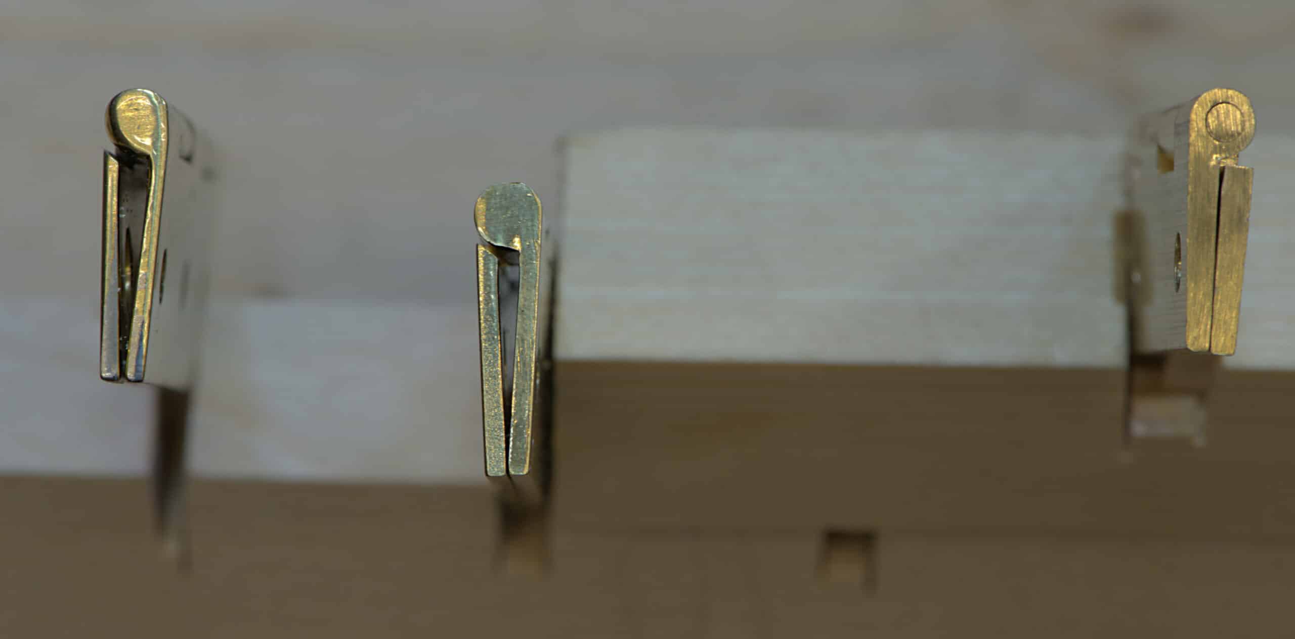 Inconsistent brass hinges