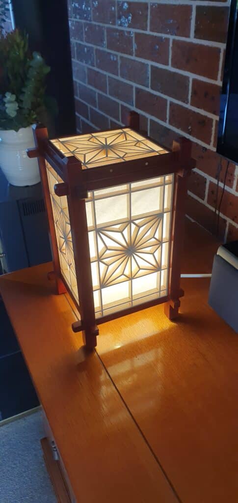 Lamp with Kumiko panels in the Asa No Ha design by Paul